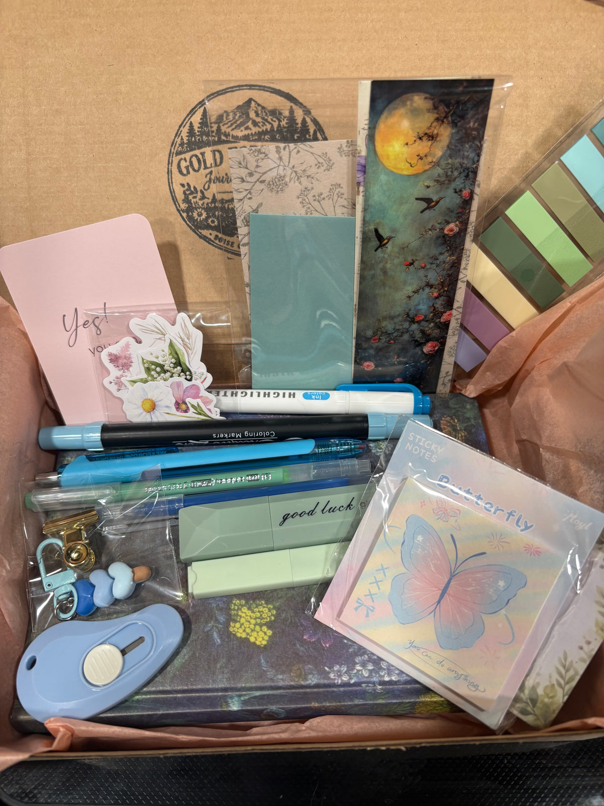 Blue journal bundle contents in Gold Fork Ridge box
